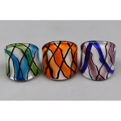 46 - A Selection of Six Murano Glass Lamp Rings. Complete with Leather Presentation Box