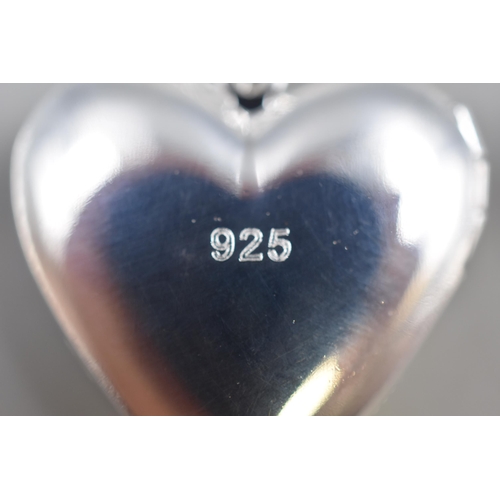 61 - A 925. Silver Heart Pendant and 30