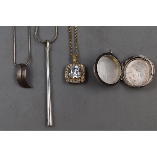 71 - Four Silver Necklaces and a Silver Locket Pendant