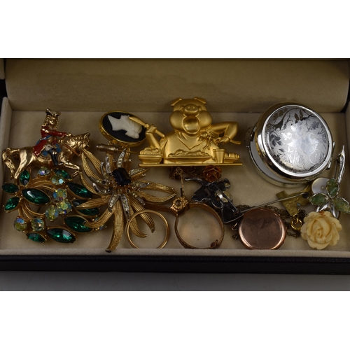 100 - A Mixed Selection of Jewellery To Include Sphinx Brooch, 9ct Gold Plated Locket and More