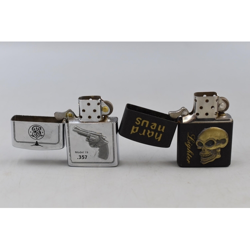 173 - Four Lighters including Ed Hardy, Hard News, Star and More