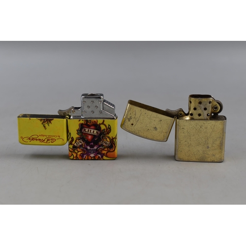 173 - Four Lighters including Ed Hardy, Hard News, Star and More