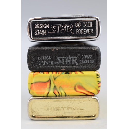 173 - Four Lighters including Ed Hardy, Hard News, Star and More