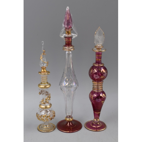 178 - A Selection of Eight Glass Perfume Bottles, Tallest Approx 9.5