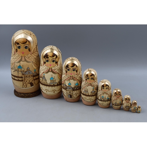 179 - 9 Piece Russian Nesting Matryoshka Hand Painted Dolls