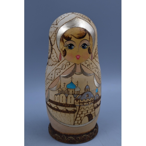 179 - 9 Piece Russian Nesting Matryoshka Hand Painted Dolls