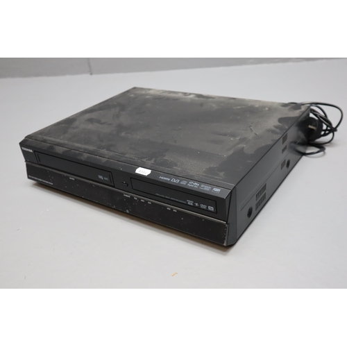 558 - Toshiba HDD and Dvd Video Cassette Recorder Model Number RDXV60KB complete with Remote, Instruction ... 