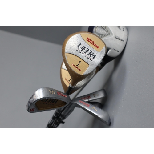 623 - Selection of 7 Wilson Golf Clubs including Ultra Wood and Irons