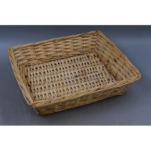 698 - A Selection of Three Wicker Baskets and A Wicker Hamper