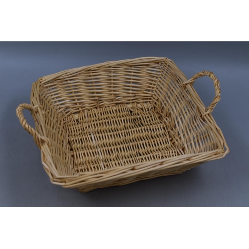 698 - A Selection of Three Wicker Baskets and A Wicker Hamper