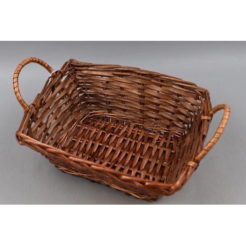 698 - A Selection of Three Wicker Baskets and A Wicker Hamper