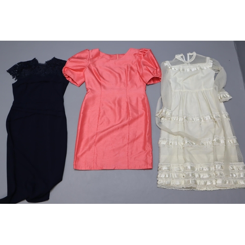 680 - A Selection of Assorted Women's Designer Clothes, With a Child's Three Piece Wedding Suit. Includes ... 