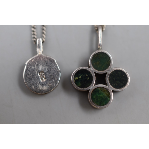 53 - Two Necklaces includes Tigers Eye Silver Pendant on Silver Chain and Green Circular Pendant (unmarke... 