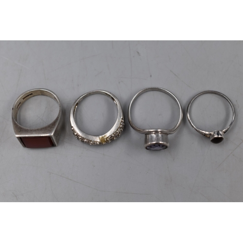 56 - Selection of 4 Silver Rings