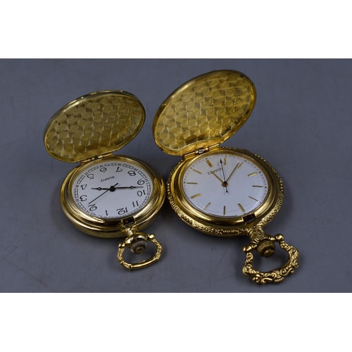 129 - Four Boxed Hachette Gold Tone Pocket Watches. Includes Poseidon, Oriental Crane, Two Lovers and Othe... 