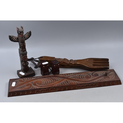 747 - Six Pieces of Carved Wooden Items. Includes Pair of Maori Salt and Pepper Shakers, Totem Pole, Spoon... 