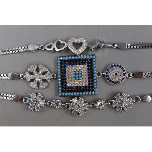 62 - Selection of Three Silver 925 Bracelets, includes Heartbeat Design and Snowflake Designs