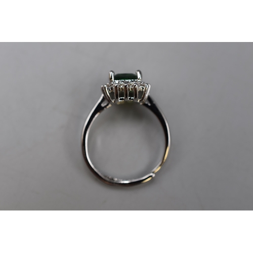 42 - A Marked 950 Green and Clear Stoned Adjustable Ring, Size P