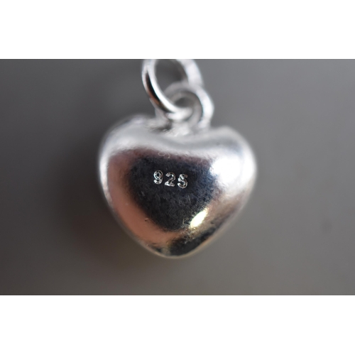 51 - A Sterling Silver Heart Pendant on Sterling Silver Chain