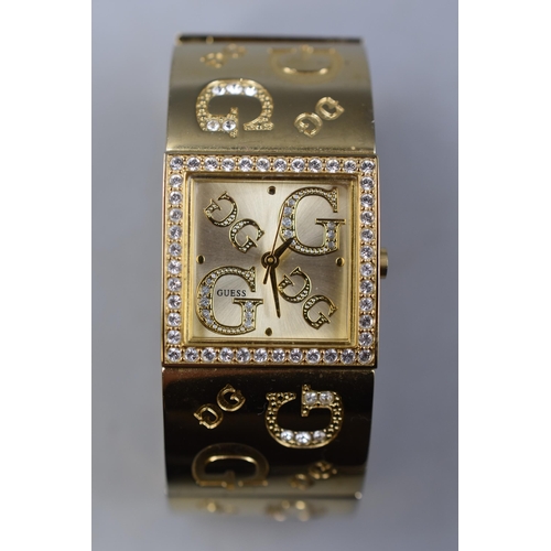 67 - A Designer Guess Gold Tone Ladies Watch, In Presentation Box