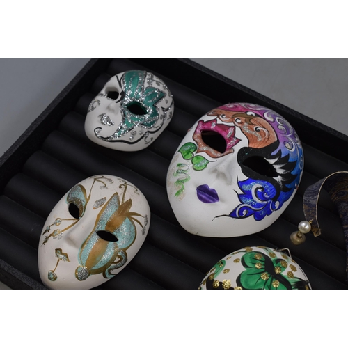 97 - A Selection of Five Mardi Gras Style Masks