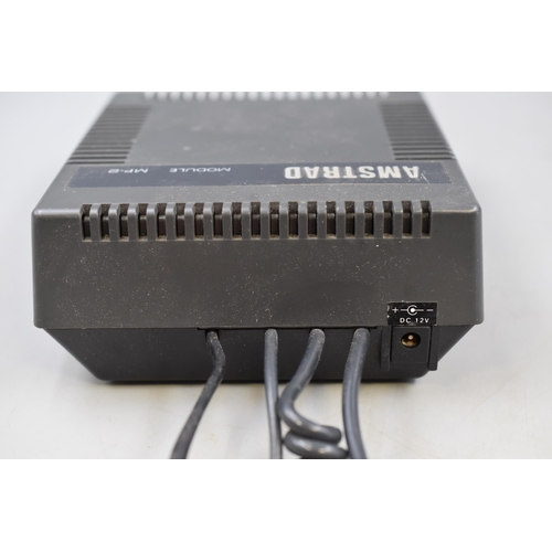 561 - Amstrad MP-2 Modulator/Switching Power Supply