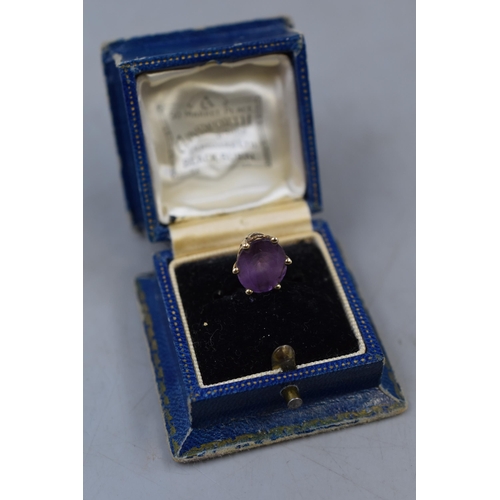 4 - A 9ct Gold Purple Stoned Loveheart Pendant, In Presentation Box