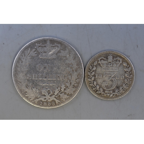 135 - Victoria Silver 1883 Shilling and a 1880 Threepence