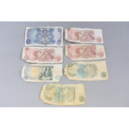 139 - A Selection of Seven UK Banknotes. Includes Three 10 Shilling Banknotes, Three One Pound Banknotes, ... 