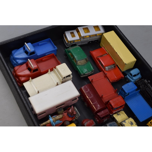 168 - Large selection of miniature play worn die cast vehicles, to include trucks, tankers, beetles cars a... 