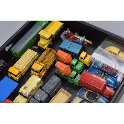 168 - Large selection of miniature play worn die cast vehicles, to include trucks, tankers, beetles cars a... 