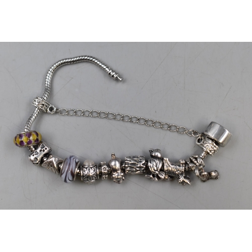 87 - Silver Charm Bracelet with 10 Silver Charms