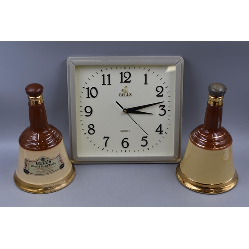 390 - Two Bells Decanters and a Bells Whisky Promotional Wall Clock