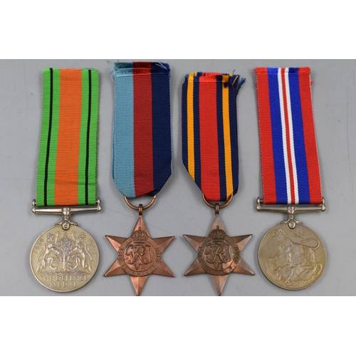 200 - Selection of Four WWII Medals including Burma Star and Defence Medal