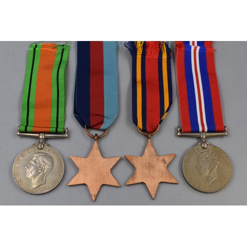 200 - Selection of Four WWII Medals including Burma Star and Defence Medal