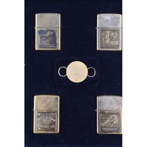 207 - Rare World War II Zippo Rememberance Collectors Edition. Includes 4 Zippo Lighters and Keyring