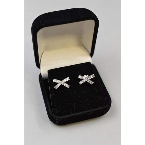 215 - Pair of 18ct (750) White Gold Diamond Tiffany & Co Kiss Earrings (missing one back). Complete wi... 