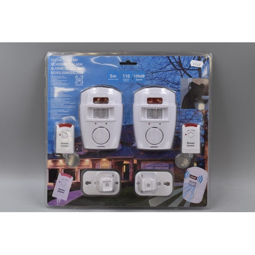 438 - Brand New Unused Wireless Alarm Security System with movement Detector and Two Remotes