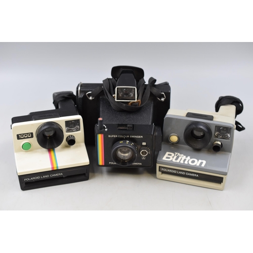 440 - Three Polaroid Instant Cameras (The Button, Swinger and Land 1000)