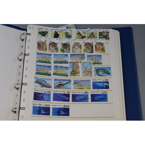 465 - Two Albums Containing a Selection of Worldwide Stamps