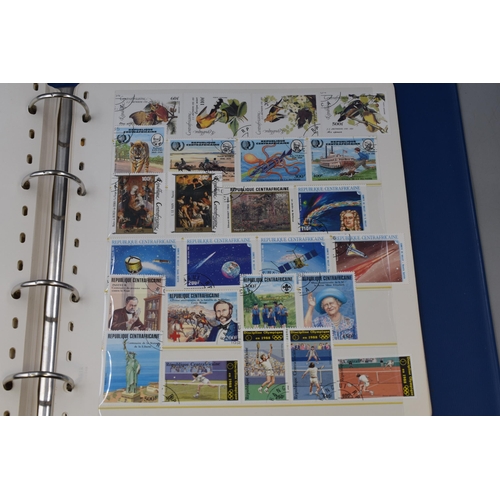 465 - Two Albums Containing a Selection of Worldwide Stamps