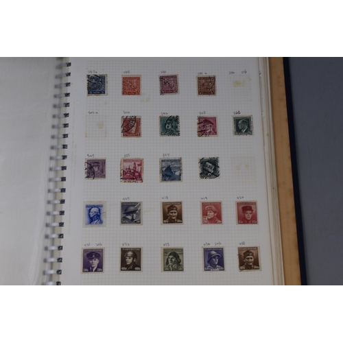 465 - Two Albums Containing a Selection of Worldwide Stamps