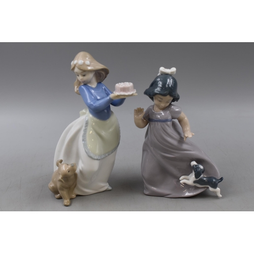 293 - Two Nao by Lladro Figures of Girls with Playful Puppies (Approx. 7.5” x 6.5”)