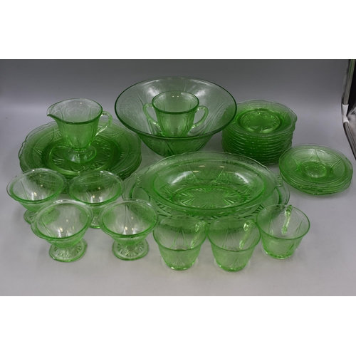 303 - Twenty-Seven Pieces of Uranium Glassware. Includes Large Bowl, Sundae Bowls, Serving Dish, Side Plat... 