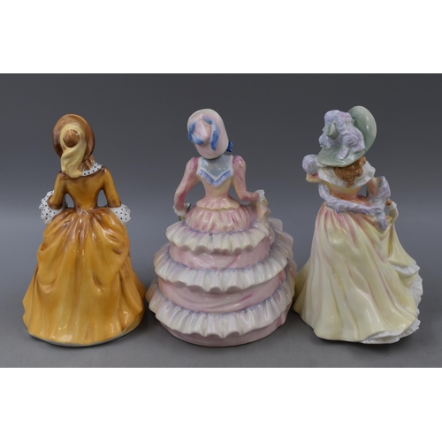 320 - Three Royal Doulton Figurines including Sandra (HN2275), Katie (HN3360) and Hannah (3369)