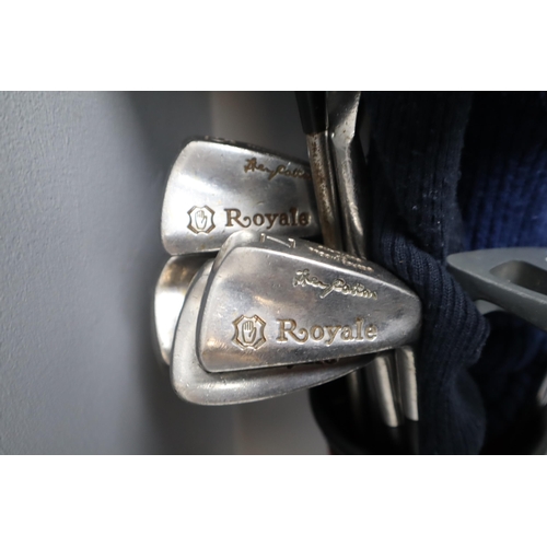 731 - Set of Royale golf clubs, 3 woods, 5 irons, putter and bag. plus 3 metal woods, putter, sandwedge an... 