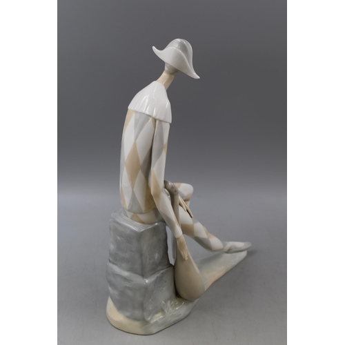 382 - A Nao By Lladro Porcelain Figure, Harlequin Jester With Musical Instrument. Approx 14