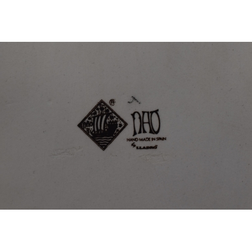 382 - A Nao By Lladro Porcelain Figure, Harlequin Jester With Musical Instrument. Approx 14