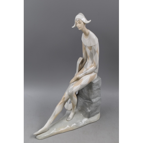 382 - A Nao By Lladro Porcelain Figure, Harlequin Jester With Musical Instrument. Approx 14