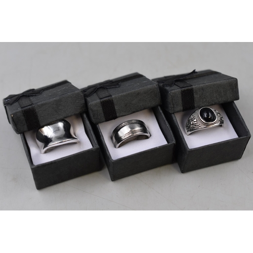 56 - Three Rings. Includes Chunky Thumb Ring, Pirate Ring, And Other. With Presentation Boxes